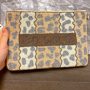 Brand new “go wild” beaded bag